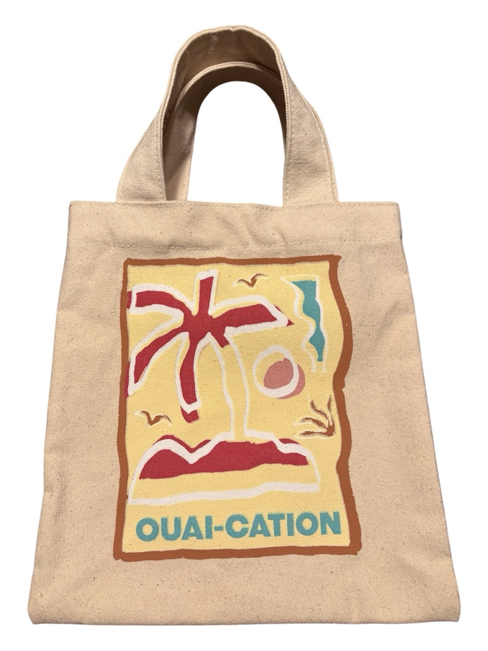 OUAI-cation limited-edition mini tote bag in Natural Cotton with Tropical Print